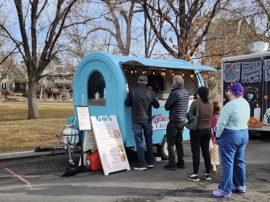 Customers in line at Olivier's crêpe trailer